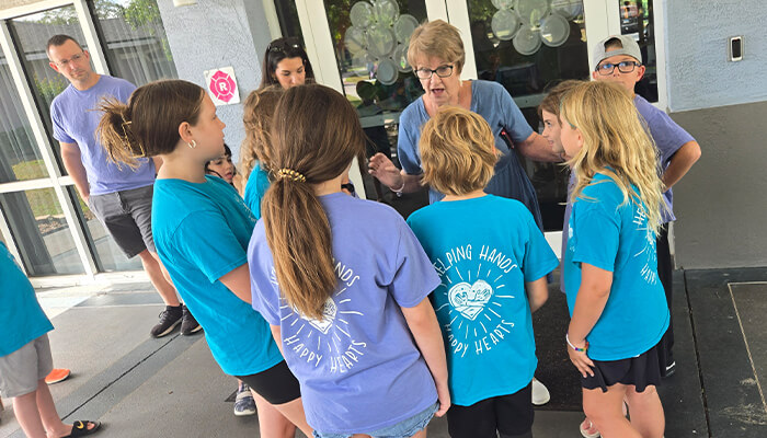 Helping Hands Happy Hearts Tampa group at A Kids Place of Tampa Bay for movie night